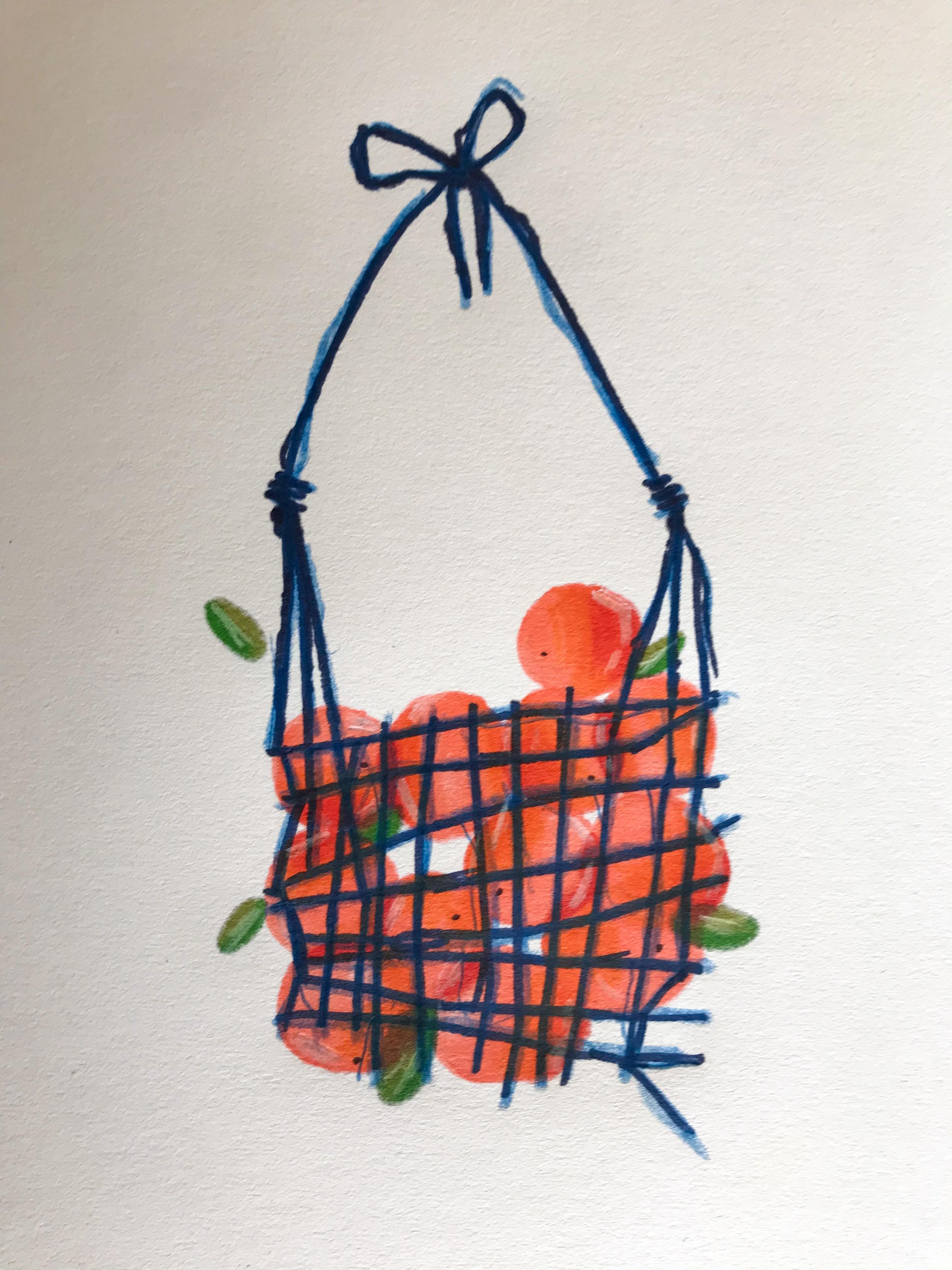 A still life of grapefruits gathered in a hanging net or basket.
